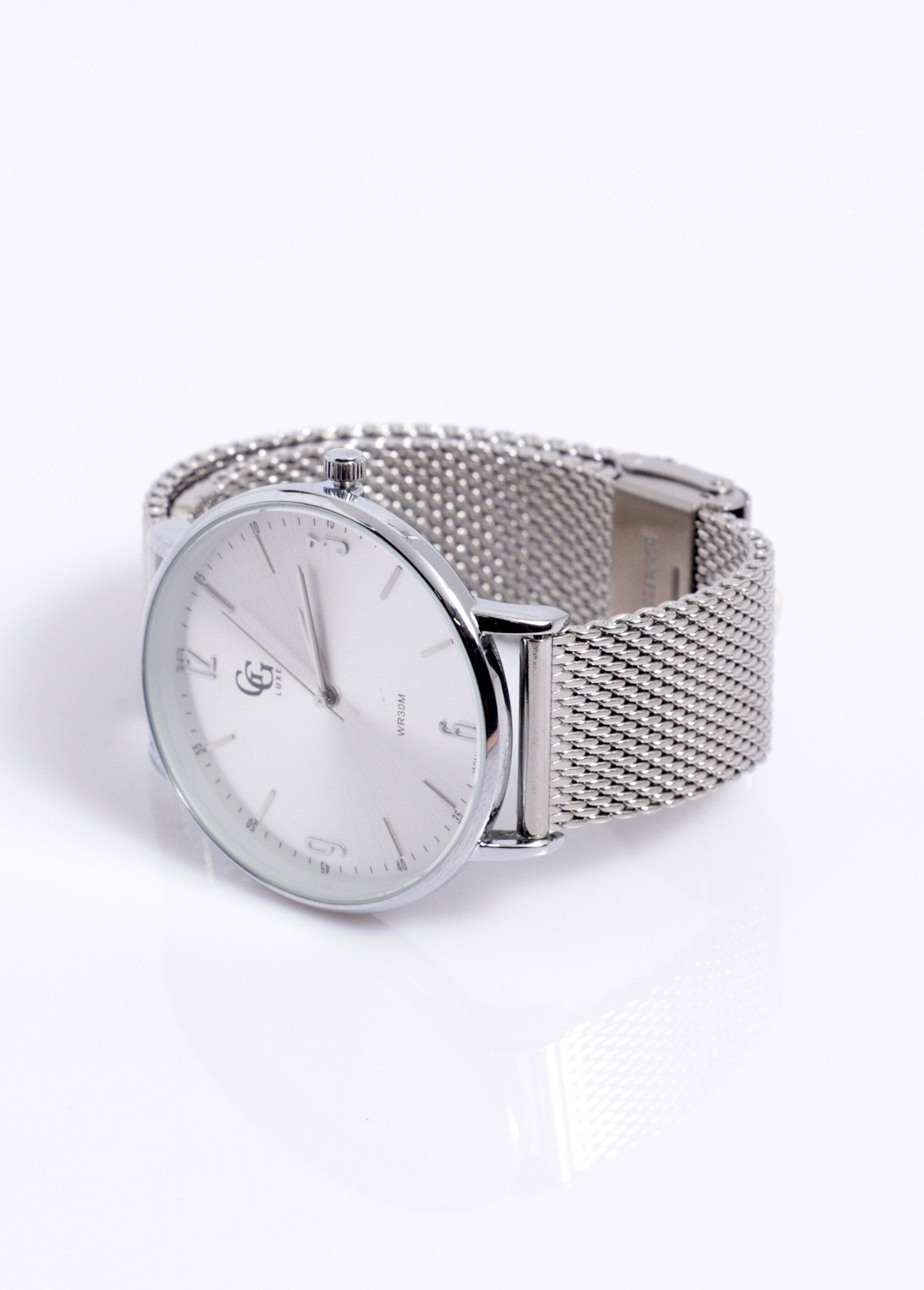 Round_watch_with_Milanese_mesh_bracelet,_1G_White_money_DE1_slim